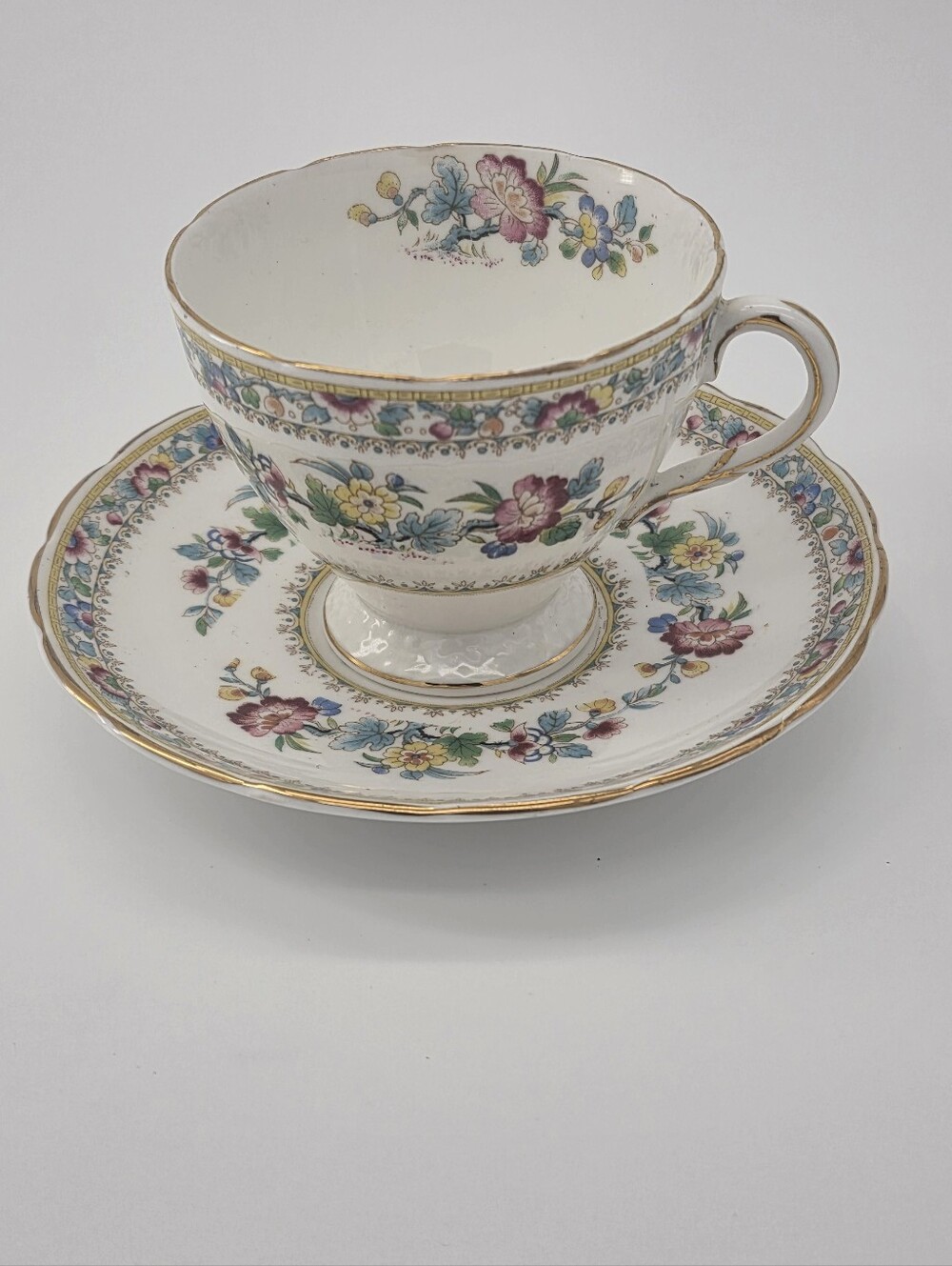 Floral Bone China Teacup and Saucer Set White with Pink and Blue Floral Pattern
